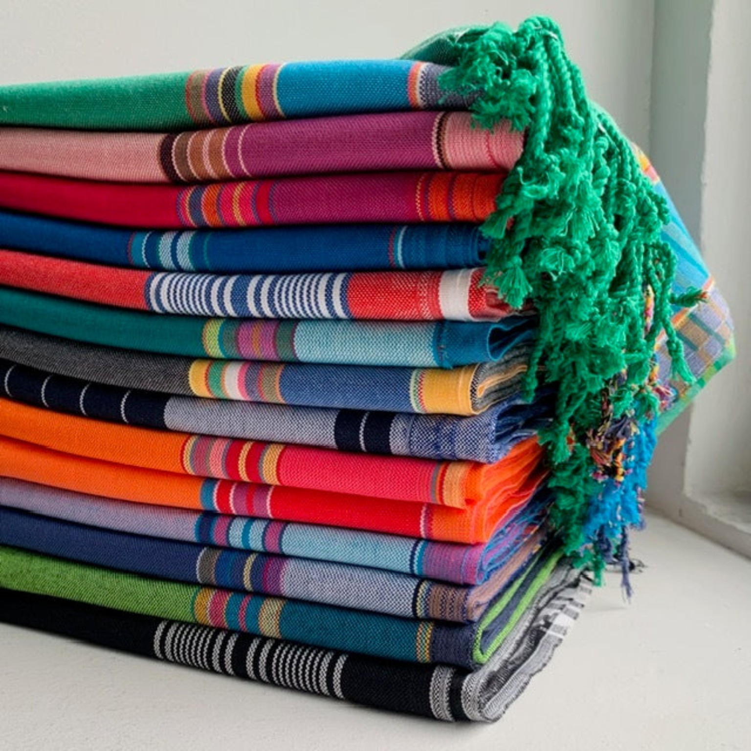 Folded colourful Sri Lankan handloom textiles